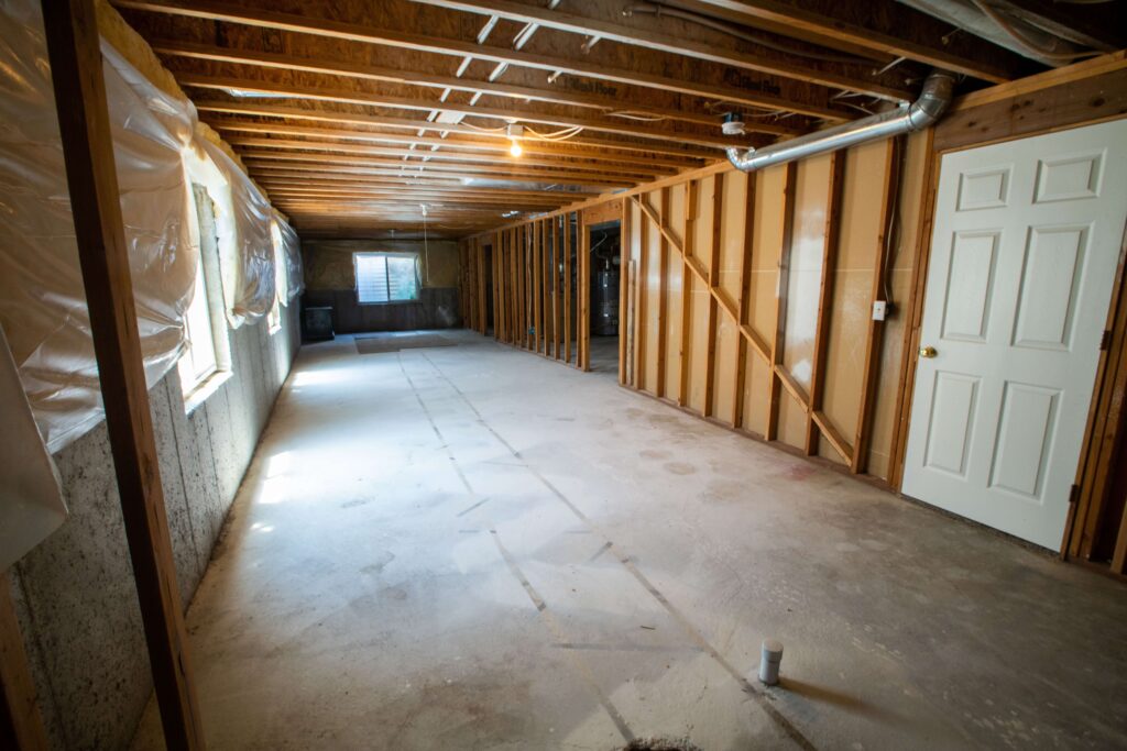 unfinished basement with exposed studs